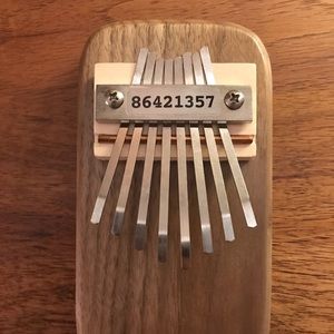 Handcrafted thumb piano with real walnut wood